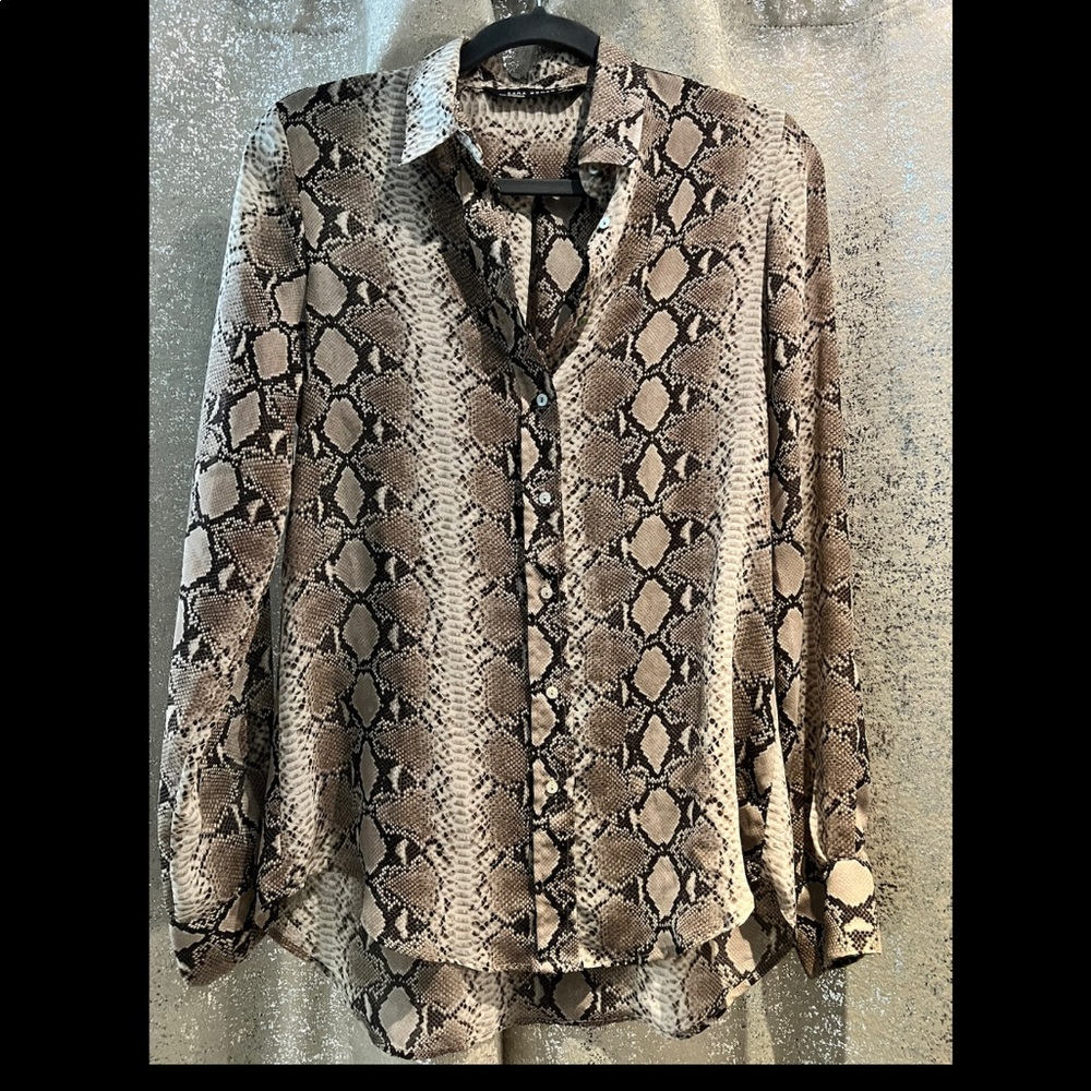 Women’s button-down sheer snake print top.